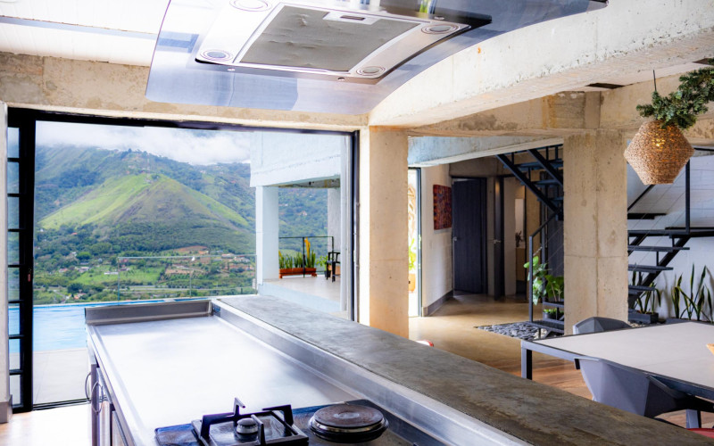 High-yield luxury villa near Medellin: 6 BR, pool, and incredibly low $23 USD annual taxes.