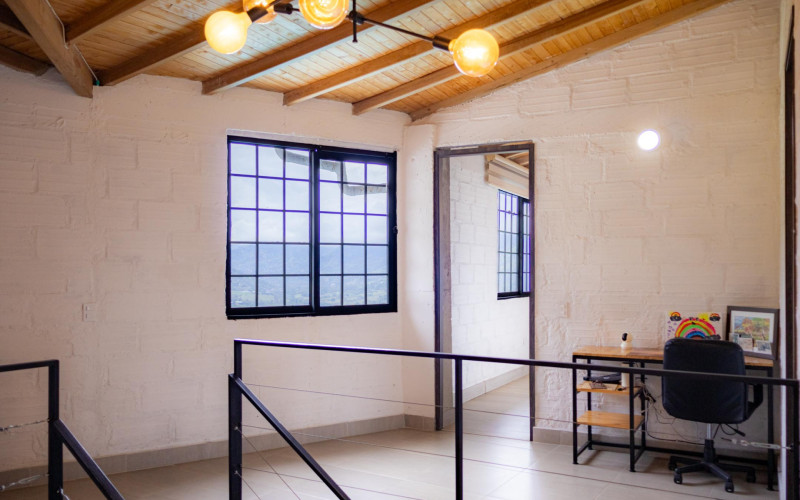 High-yield luxury villa near Medellin: 6 BR, pool, and incredibly low $23 USD annual taxes.